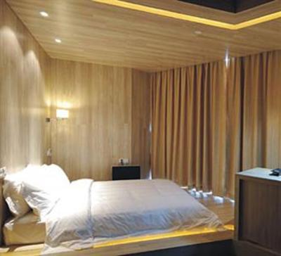 фото отеля Designer Hotel Dongguan
