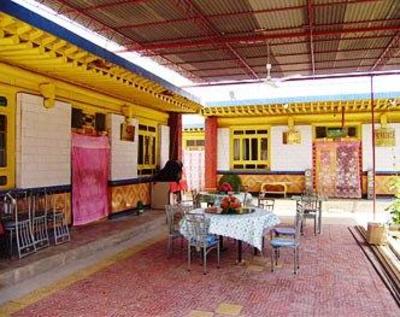 фото отеля Jinlong Inn Huanghe Shilin