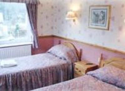 фото отеля Twa Dogs Inn