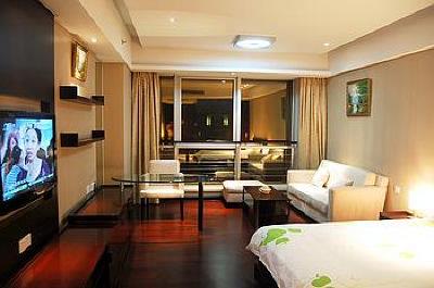 фото отеля Binjiang Kending Serviced Apartment Hotel