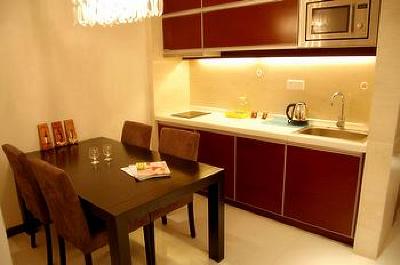 фото отеля Binjiang Kending Serviced Apartment Hotel