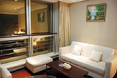 фото отеля Binjiang Kending Serviced Apartment Hotel