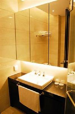 фото отеля Binjiang Kending Serviced Apartment Hotel