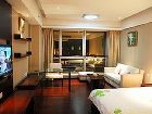 фото отеля Binjiang Kending Serviced Apartment Hotel
