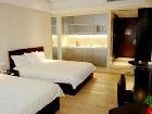 фото отеля Binjiang Kending Serviced Apartment Hotel