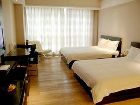 фото отеля Binjiang Kending Serviced Apartment Hotel