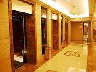 фото отеля Binjiang Kending Serviced Apartment Hotel