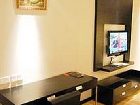 фото отеля Binjiang Kending Serviced Apartment Hotel