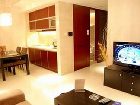 фото отеля Binjiang Kending Serviced Apartment Hotel