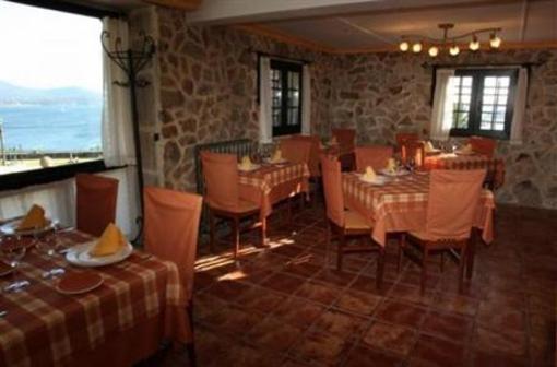 фото отеля Rustico Punta Uia Hotel Muros
