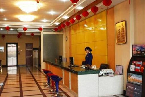 фото отеля Huaqiao Business Hotel Railway Station