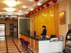 фото отеля Huaqiao Business Hotel Railway Station