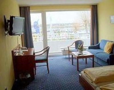 фото отеля Yachthafen Hotel