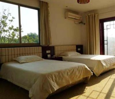 фото отеля Qianlong Lake Eco-Tourism Resort