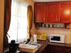 фото отеля Gelleny Szallo Apartman