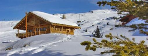 фото отеля Les Chalets de l'Altiport