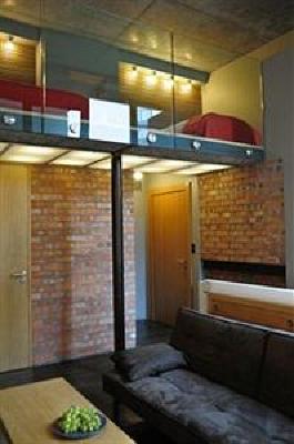 фото отеля La Gioia Designer's Lofts Luxury Apartments