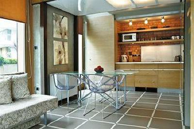 фото отеля La Gioia Designer's Lofts Luxury Apartments