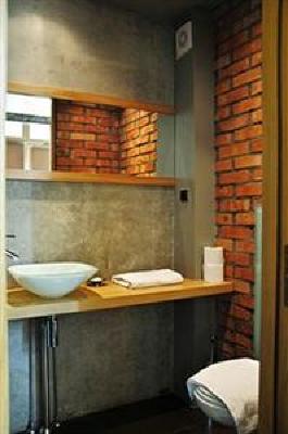 фото отеля La Gioia Designer's Lofts Luxury Apartments