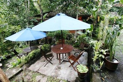 фото отеля The Riverside Javanese Cottages