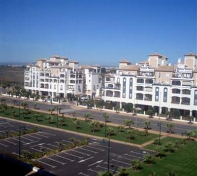 фото отеля Apartamentos El Faro Marina