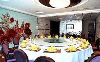 фото отеля Kunlun Business Hotel