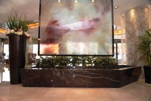 фото отеля Budgetel Huadu Hotel