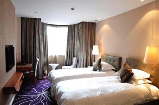 фото отеля Budgetel Huadu Hotel