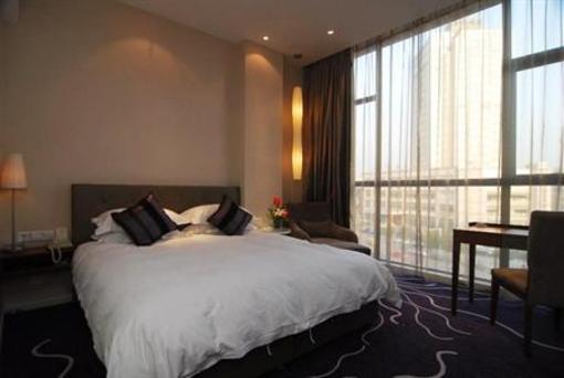 фото отеля Budgetel Huadu Hotel