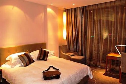 фото отеля Budgetel Huadu Hotel