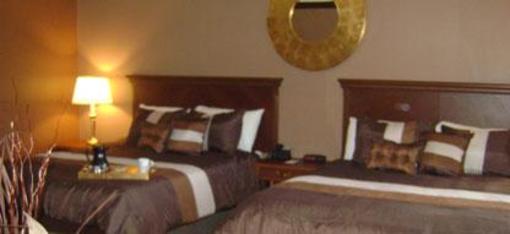 фото отеля Talbot Trail Inn & Suites