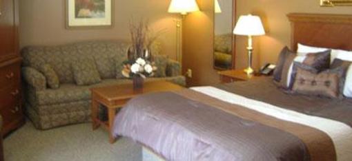 фото отеля Talbot Trail Inn & Suites