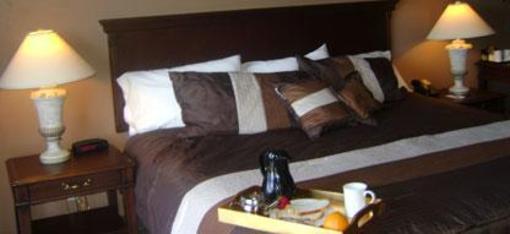 фото отеля Talbot Trail Inn & Suites