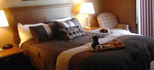 фото отеля Talbot Trail Inn & Suites