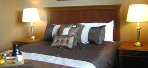 фото отеля Talbot Trail Inn & Suites