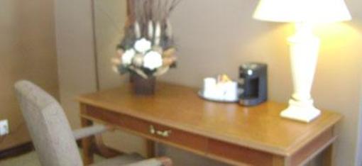 фото отеля Talbot Trail Inn & Suites
