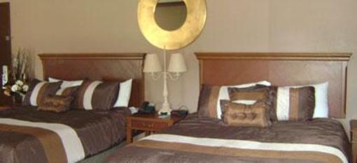 фото отеля Talbot Trail Inn & Suites