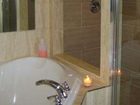 фото отеля Talbot Trail Inn & Suites