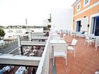 фото отеля Hostal Porto Colom Felanitx