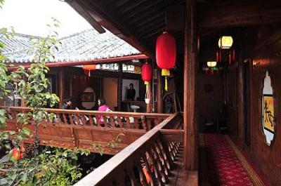 фото отеля Woxing Wosu Inn Shuijing Zhuyuan