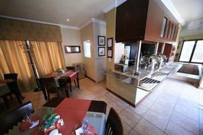 фото отеля Le Cozmo Guesthouse