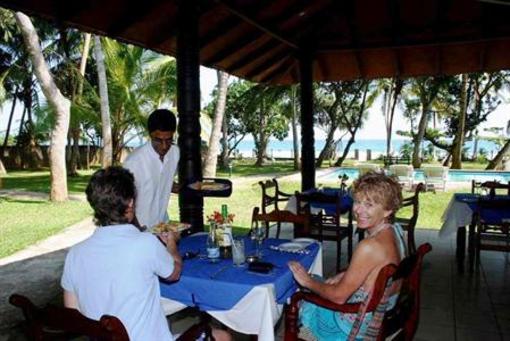 фото отеля Manahara Beach Cottage & Cabanas