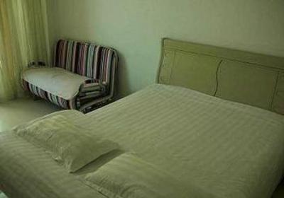 фото отеля Tianxing Luosifu Apartment