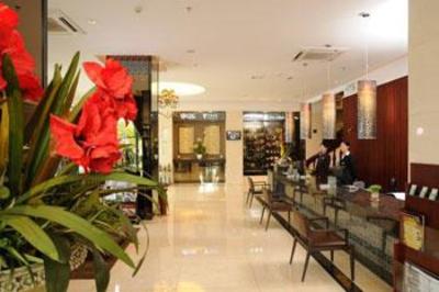 фото отеля Guanglian Business Hotel Xingbao