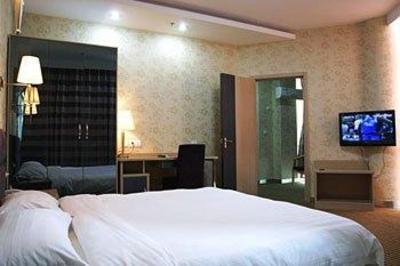 фото отеля Jiukun Holiday Hotel