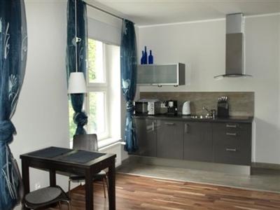 фото отеля Grand Tourist Apartment Merlin
