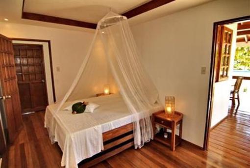 фото отеля Talima Beach Villas and Dive Resort