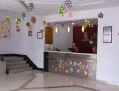 фото отеля Yantai Qi Xia Hotel