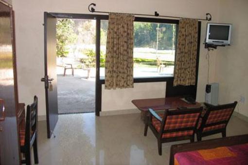 фото отеля Corbett Riverside Resort Ramnagar