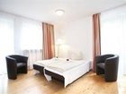 фото отеля Hotelpension zum Gockl